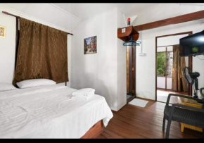 Hillside cottage reflesia room